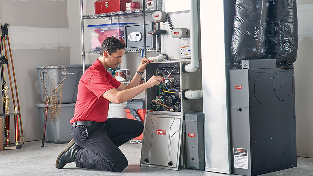 A Bryant dealer finishes performing an HVAC installation